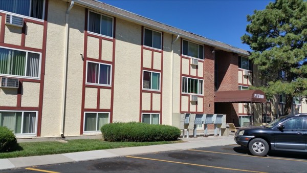 Side of the building with the Pinewood awning and resident mailboxes